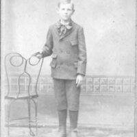 BS1089-Young Boy Standing Near Chair, ca1895, 2017-15-133.jpg