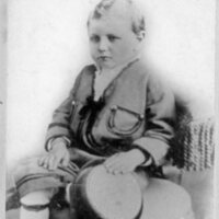 BS1697-Young Boy Sitting w Object, ca1870, 2017-15-132.jpg